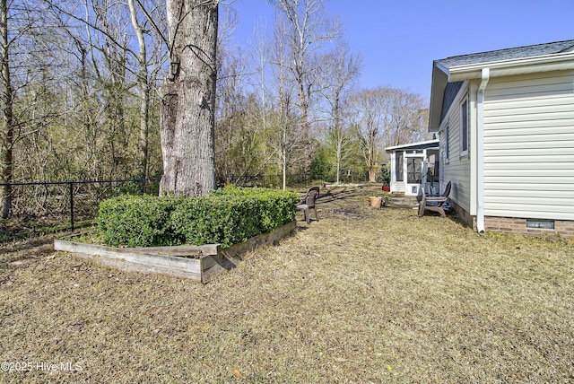 view of yard with entry steps and fence