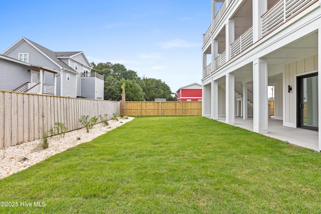 view of yard featuring a fenced backyard and a patio