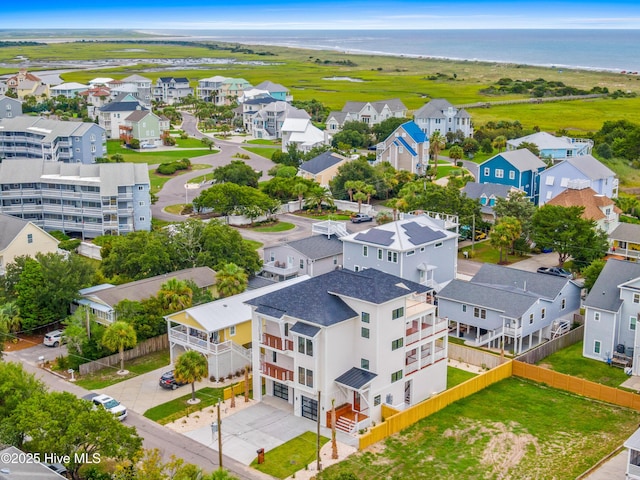 aerial view with a residential view and a water view