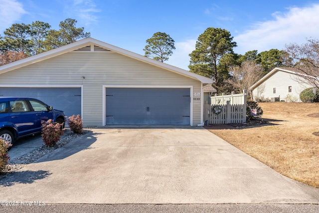 garage with fence