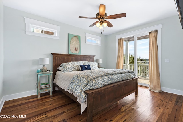 bedroom featuring dark wood-style floors, baseboards, a ceiling fan, and access to exterior