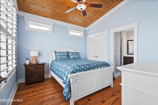 bedroom featuring baseboards, wood ceiling, ornamental molding, dark wood-style flooring, and vaulted ceiling