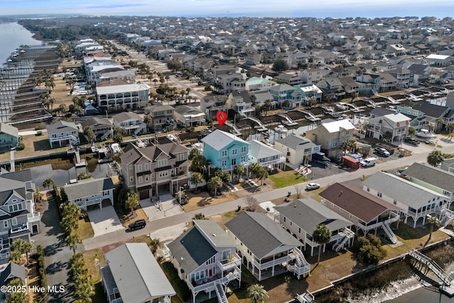 birds eye view of property with a residential view