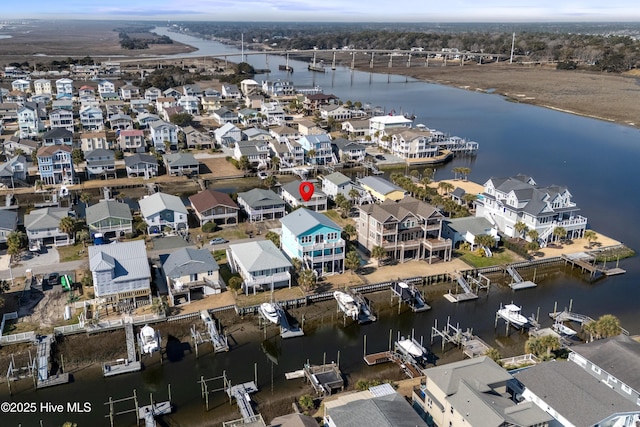 aerial view with a water view and a residential view