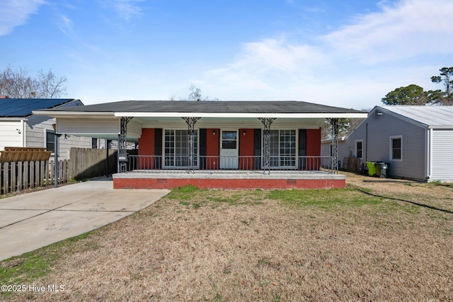 ranch-style home with driveway, crawl space, fence, a porch, and a front yard