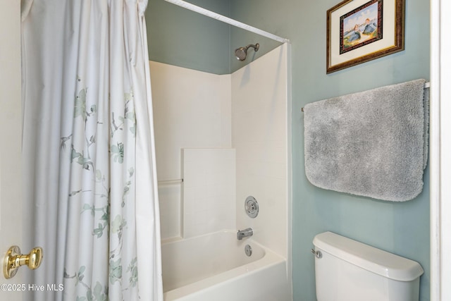 full bathroom featuring shower / bathtub combination with curtain and toilet