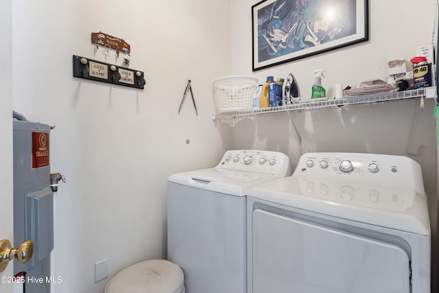 laundry area featuring laundry area and washing machine and clothes dryer