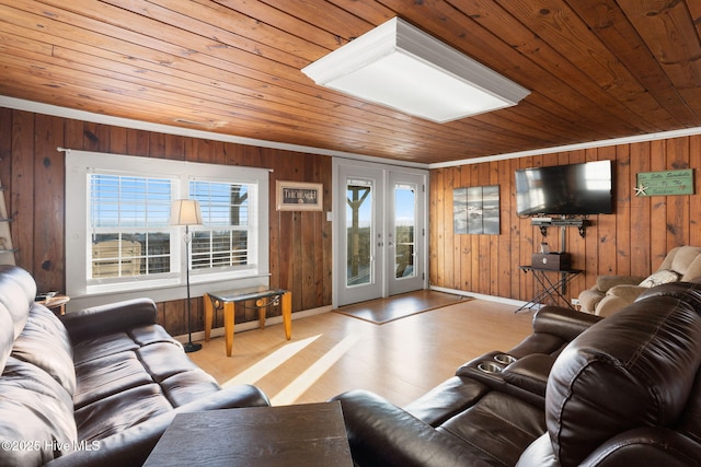 living area with light wood-type flooring, wood ceiling, french doors, and baseboards