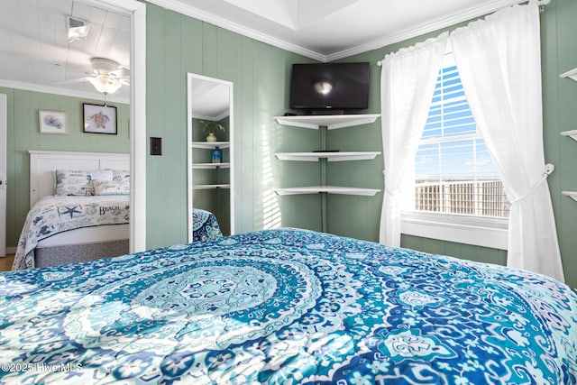 bedroom with crown molding