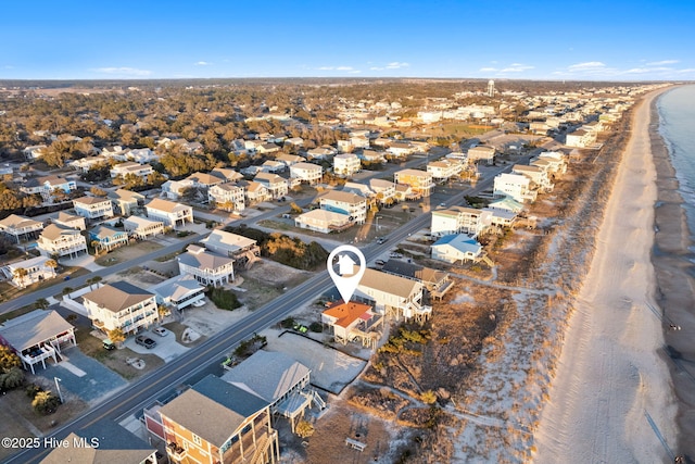 bird's eye view featuring a water view and a residential view