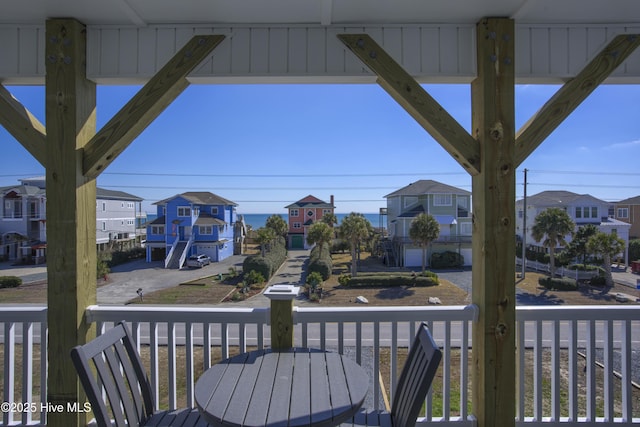 wooden deck featuring a residential view