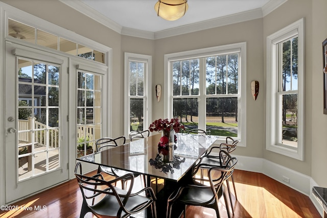 sunroom / solarium with plenty of natural light and french doors