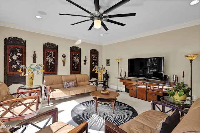 living room with ornamental molding, ceiling fan, recessed lighting, and light colored carpet