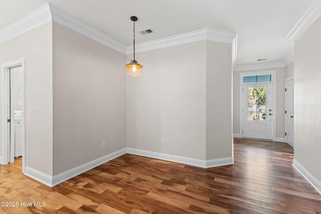 interior space with baseboards, crown molding, visible vents, and dark wood-style flooring