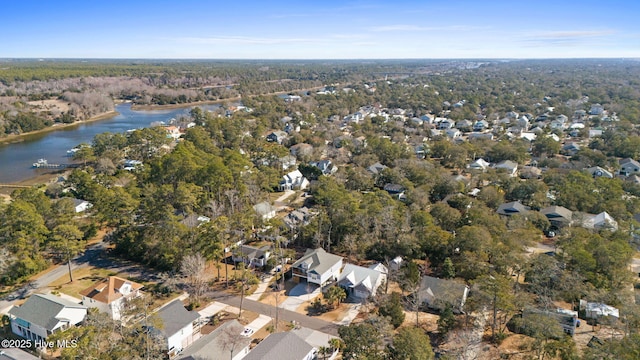 birds eye view of property with a water view and a residential view