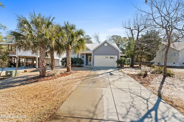 view of front facade featuring an attached garage and concrete driveway