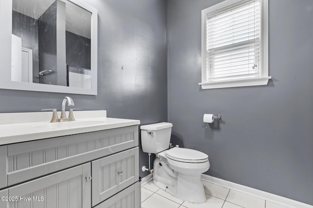 128 Pamlico Dr, Holly Ridge, NC 28445 - half bath featuring toilet, tile patterned floors, baseboards, and vanity