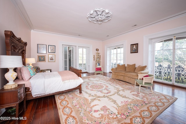 bedroom featuring access to exterior, visible vents, crown molding, and dark wood-style floors