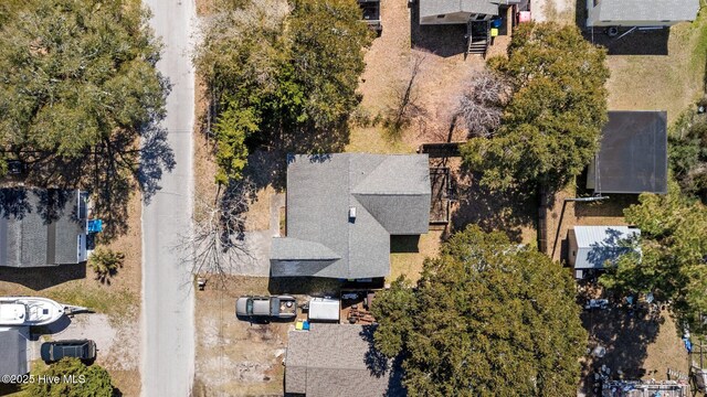 bird's eye view featuring a residential view and a water view