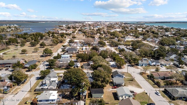 aerial view featuring a residential view and a water view