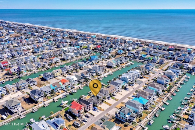 aerial view featuring a water view and a residential view