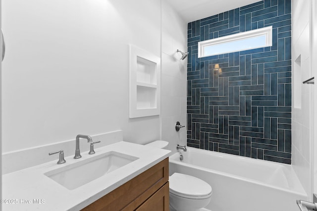 full bathroom featuring shower / washtub combination, vanity, and toilet