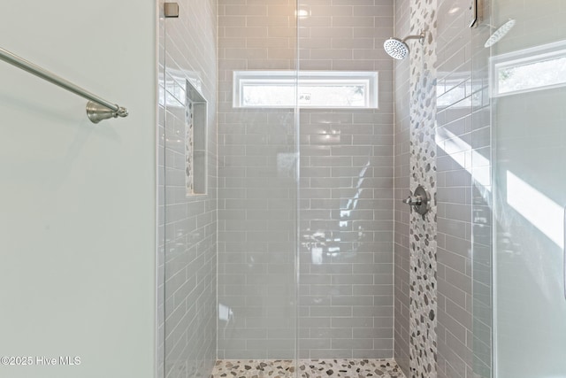 6803 E Yacht Dr, Oak Island, NC 28465 - bathroom with a shower stall and plenty of natural light