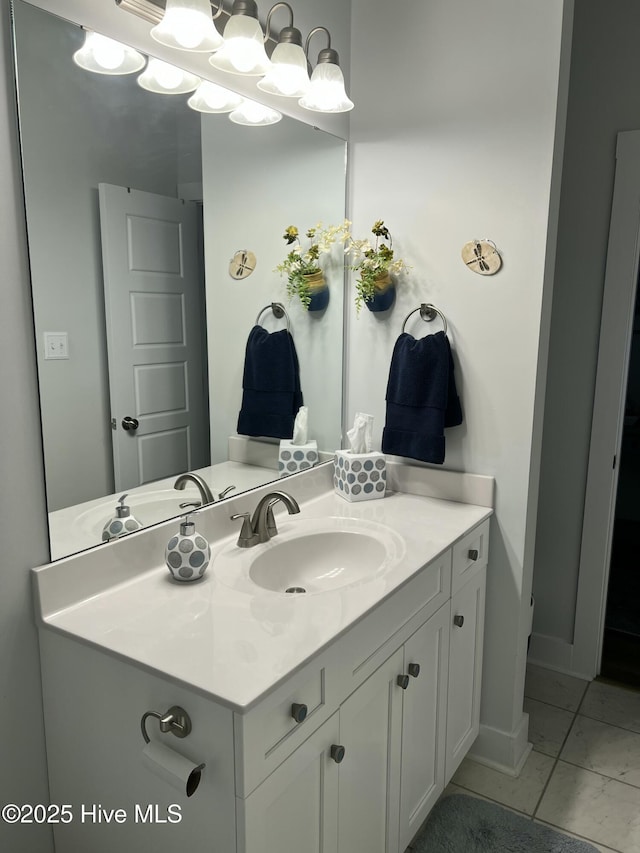 bathroom featuring vanity and baseboards