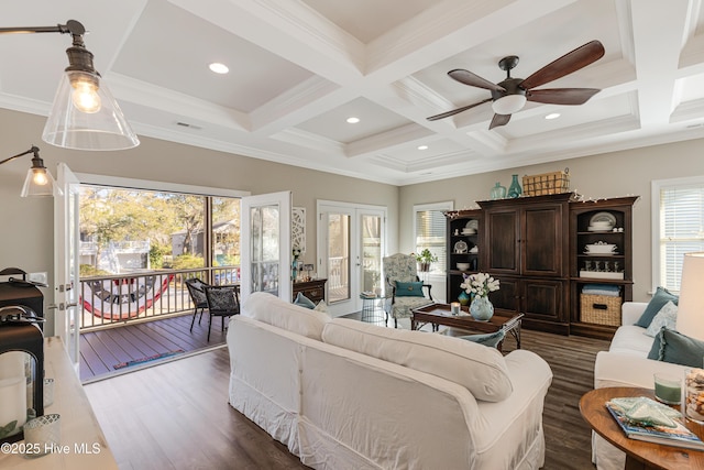 living room featuring french doors, coffered ceiling, dark wood finished floors, and beam ceiling