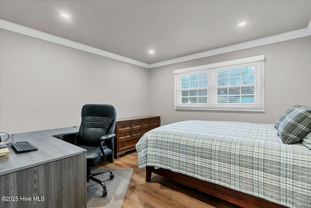 bedroom featuring crown molding, recessed lighting, and light wood-type flooring