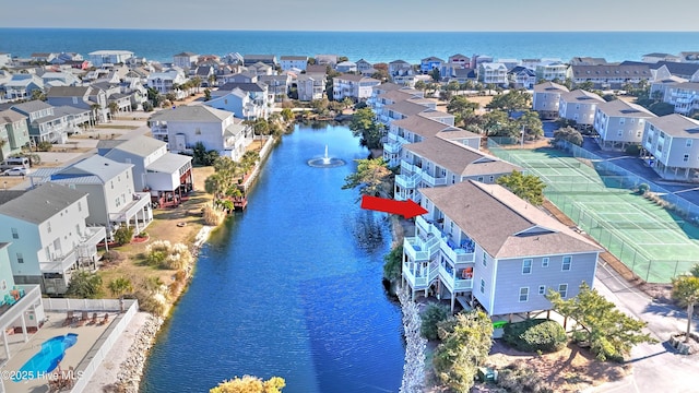 aerial view featuring a water view and a residential view