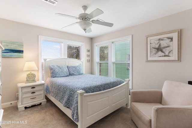 308 Carolina Beach Ave S Unit 1, Carolina Beach, NC 28428 - bedroom with visible vents, a closet, and ceiling fan