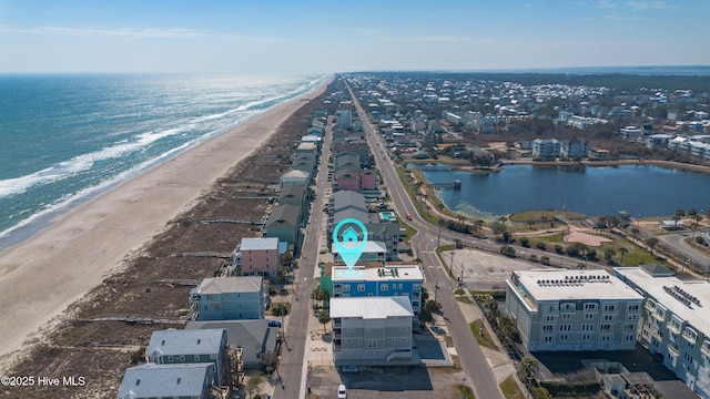 aerial view featuring a water view and a view of the beach