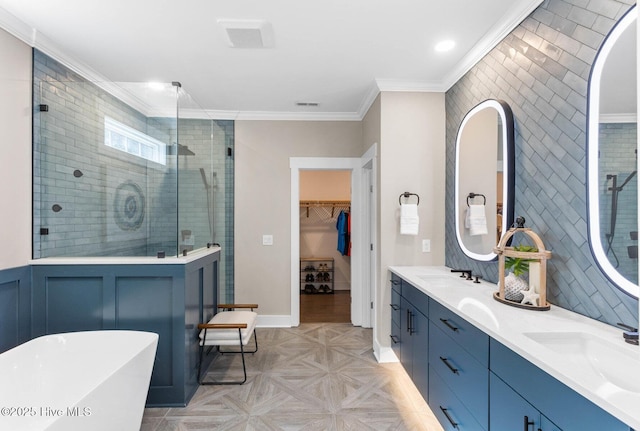 935 Baldwin Park Dr, Wilmington, NC 28411 - full bath featuring double vanity, a shower stall, a spacious closet, a freestanding tub, and crown molding