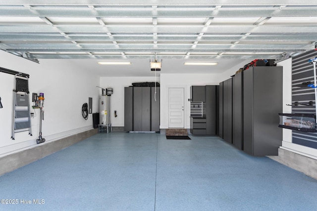 935 Baldwin Park Dr, Wilmington, NC 28411 - garage with water heater and a garage door opener