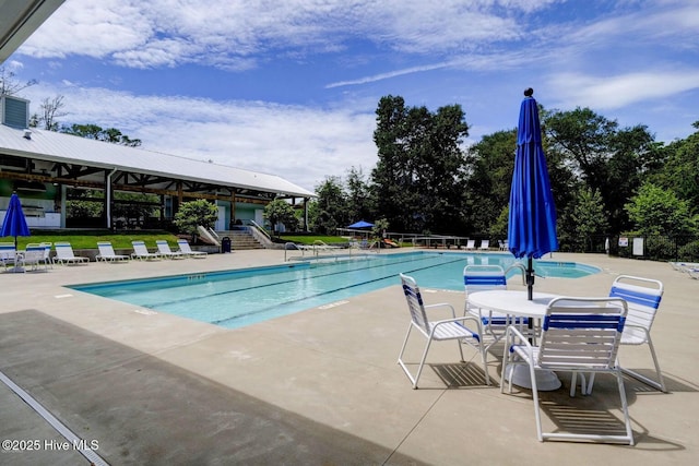 935 Baldwin Park Dr, Wilmington, NC 28411 - community pool with a patio area