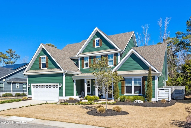 935 Baldwin Park Dr, Wilmington, NC 28411 - craftsman house with concrete driveway, a porch, and roof with shingles
