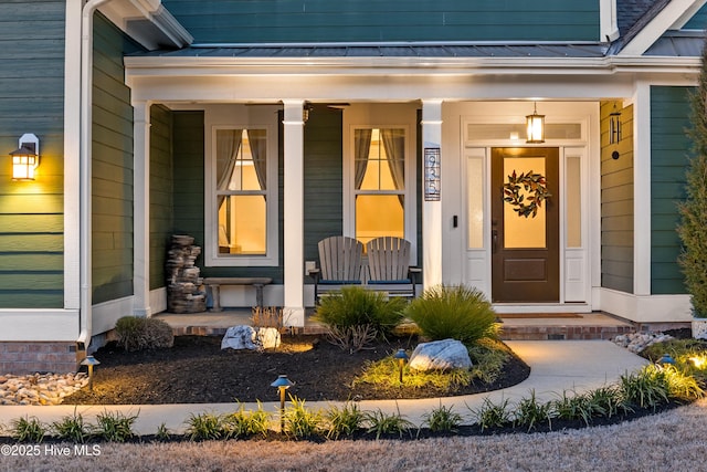 935 Baldwin Park Dr, Wilmington, NC 28411 - property entrance with a porch and metal roof