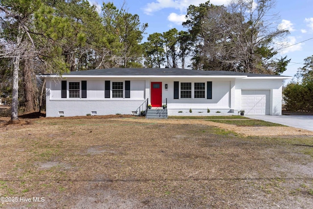 ranch-style house featuring a garage, crawl space, brick siding, and concrete driveway