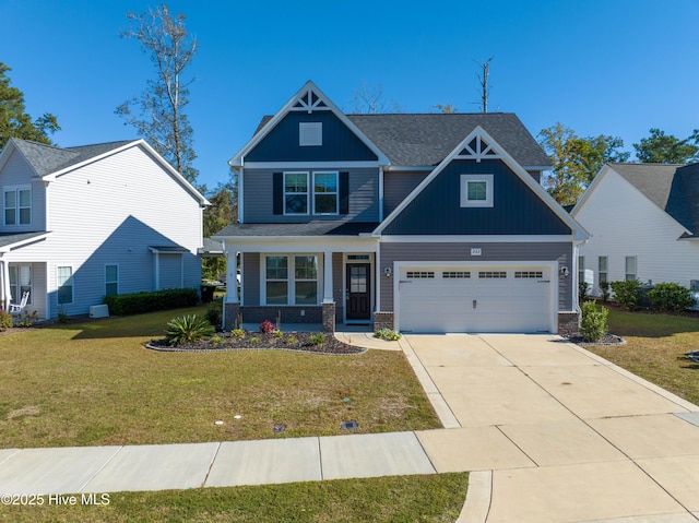 craftsman-style home featuring driveway, covered porch, a front lawn, and board and batten siding