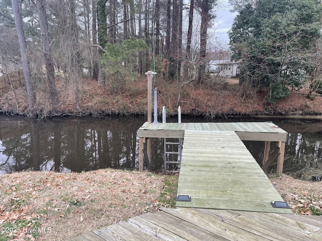 view of dock with a water view