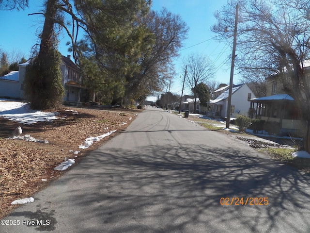 view of street featuring a residential view