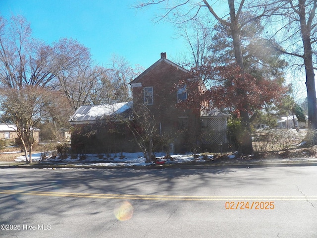 view of snow covered property