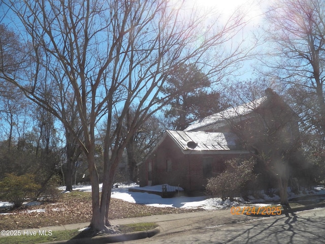 view of snow covered property