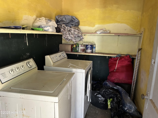 clothes washing area with laundry area and separate washer and dryer