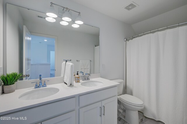 full bath with toilet, a sink, and visible vents