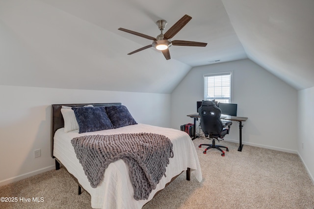 carpeted bedroom featuring a ceiling fan, vaulted ceiling, and baseboards