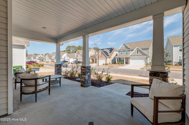 view of patio featuring a residential view and covered porch