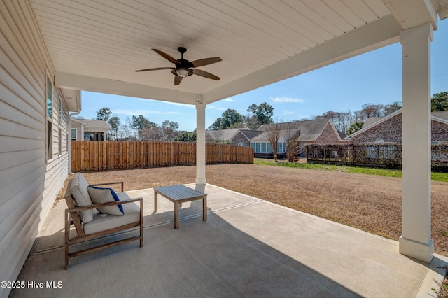 view of patio featuring a ceiling fan and a fenced backyard