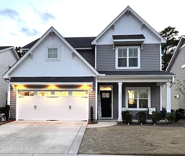 view of front of home featuring covered porch and driveway